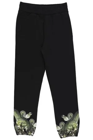 MARCELO BURLON PARTES DE ABAJO - Pantalones