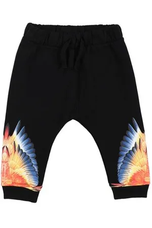 MARCELO BURLON PARTES DE ABAJO - Pantalones