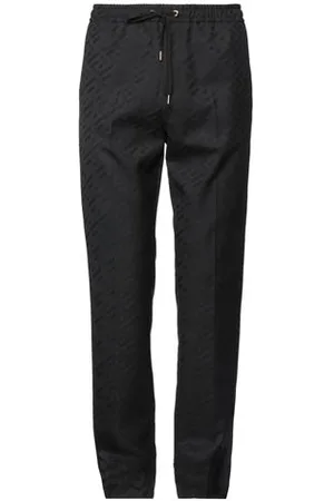 VERSACE PARTES DE ABAJO - Pantalones