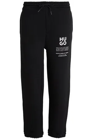 HUGO BOSS PARTES DE ABAJO - Pantalones