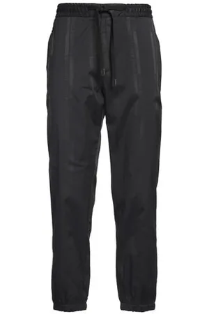 VERSACE PARTES DE ABAJO - Pantalones