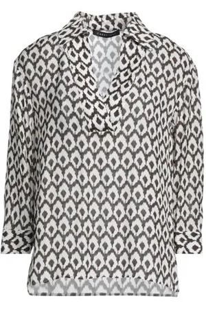 Caractere CAMISETAS Y TOPS - Tops