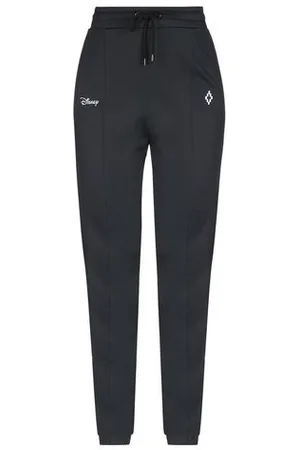 MARCELO BURLON PARTES DE ABAJO - Pantalones