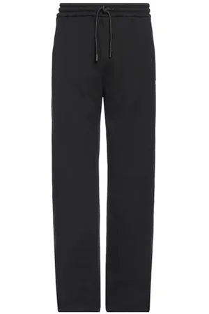 OFF-WHITE PARTES DE ABAJO - Pantalones