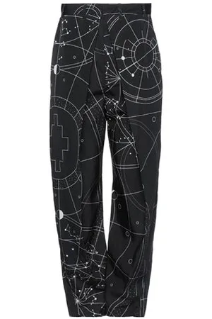 MARCELO BURLON PARTES DE ABAJO - Pantalones