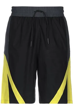 MARCELO BURLON PARTES DE ABAJO - Pantalones cortos y bermudas