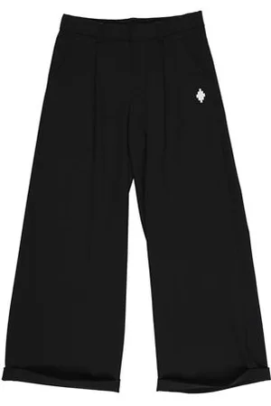MARCELO BURLON PARTES DE ABAJO - Pantalones
