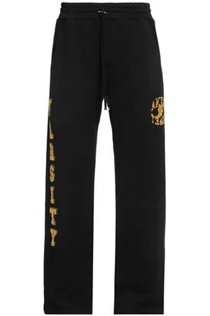 AMIRI PARTES DE ABAJO - Pantalones