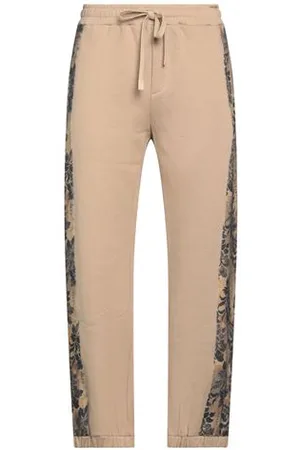 VERSACE PARTES DE ABAJO - Pantalones