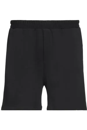 MARCELO BURLON PARTES DE ABAJO - Pantalones cortos y bermudas