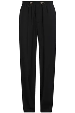 VERSACE PARTES DE ABAJO - Pantalones