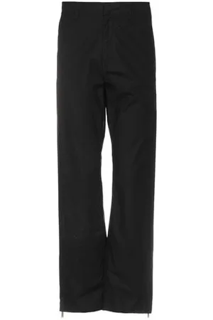 MARCELO BURLON PARTES DE ABAJO - Pantalones