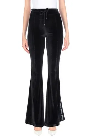 MARCELO BURLON PARTES DE ABAJO - Pantalones