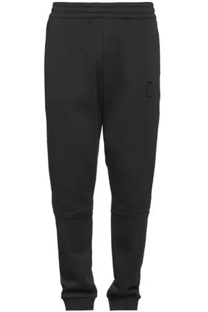EA7 PARTES DE ABAJO - Pantalones