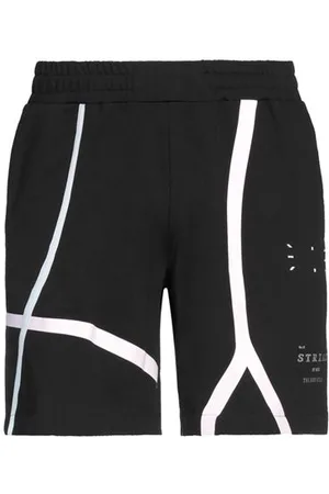 Alexander McQueen PARTES DE ABAJO - Pantalones cortos y bermudas