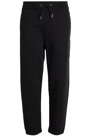 HUGO BOSS PARTES DE ABAJO - Pantalones