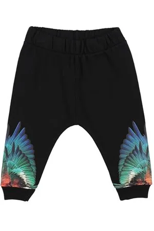 MARCELO BURLON PARTES DE ABAJO - Pantalones