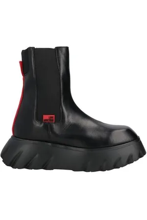 Moschino CALZADO - Botines de caña alta