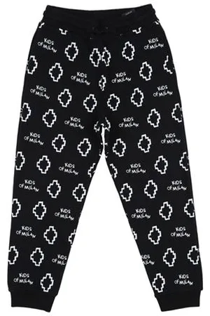 MARCELO BURLON PARTES DE ABAJO - Pantalones