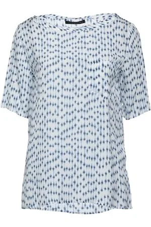 Caractere CAMISETAS Y TOPS - Tops