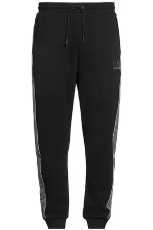 EA7 PARTES DE ABAJO - Pantalones