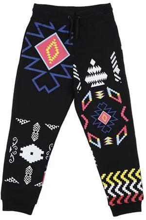 MARCELO BURLON PARTES DE ABAJO - Pantalones