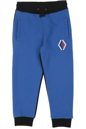MARCELO BURLON PARTES DE ABAJO - Pantalones