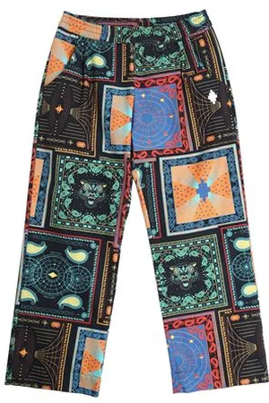MARCELO BURLON PARTES DE ABAJO - Pantalones