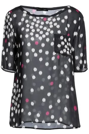Caractere CAMISETAS Y TOPS - Tops
