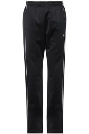 MARCELO BURLON PARTES DE ABAJO - Pantalones
