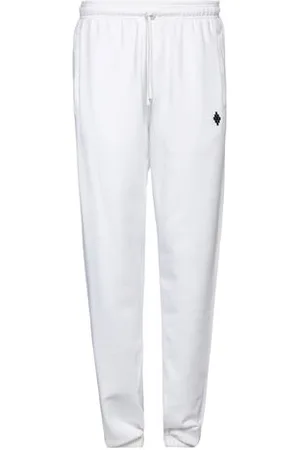 MARCELO BURLON PARTES DE ABAJO - Pantalones
