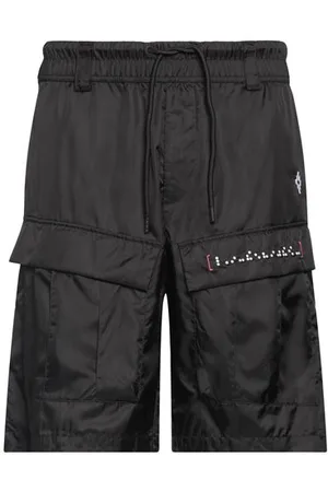 MARCELO BURLON PARTES DE ABAJO - Pantalones cortos y bermudas