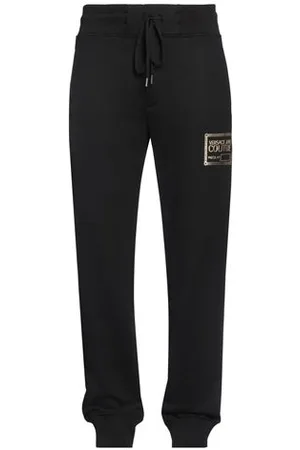 VERSACE PARTES DE ABAJO - Pantalones