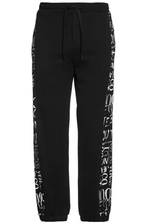 VERSACE PARTES DE ABAJO - Pantalones