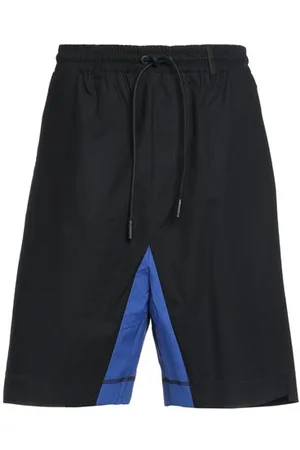 MARCELO BURLON PARTES DE ABAJO - Pantalones cortos y bermudas