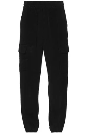 MARCELO BURLON PARTES DE ABAJO - Pantalones