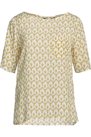 Caractere CAMISETAS Y TOPS - Tops