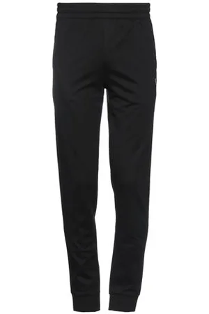 EA7 PARTES DE ABAJO - Pantalones