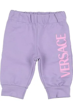 VERSACE PARTES DE ABAJO - Pantalones