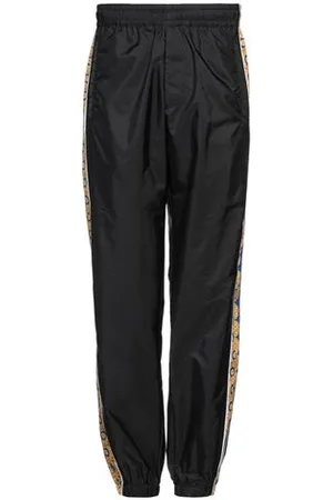VERSACE PARTES DE ABAJO - Pantalones