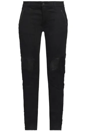 MARCELO BURLON PARTES DE ABAJO - Pantalones