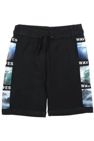 MARCELO BURLON PARTES DE ABAJO - Pantalones cortos y bermudas