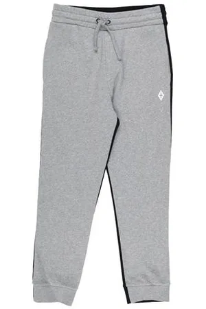 MARCELO BURLON PARTES DE ABAJO - Pantalones