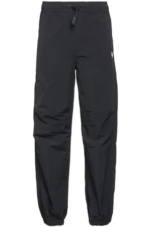 MARCELO BURLON PARTES DE ABAJO - Pantalones