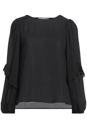 Caractere CAMISETAS Y TOPS - Tops