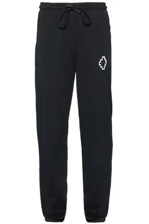 MARCELO BURLON PARTES DE ABAJO - Pantalones