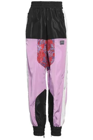 VERSACE PARTES DE ABAJO - Pantalones