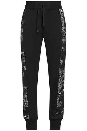 VERSACE PARTES DE ABAJO - Pantalones