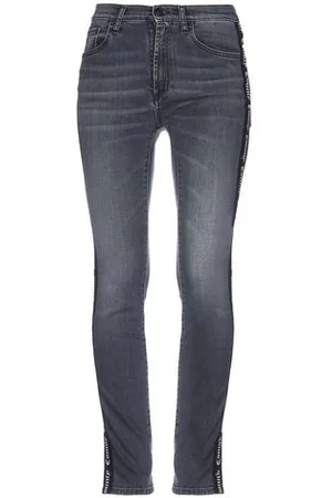 MARCELO BURLON PARTES DE ABAJO - Pantalones vaqueros