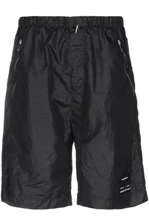 MARCELO BURLON PARTES DE ABAJO - Pantalones cortos y bermudas